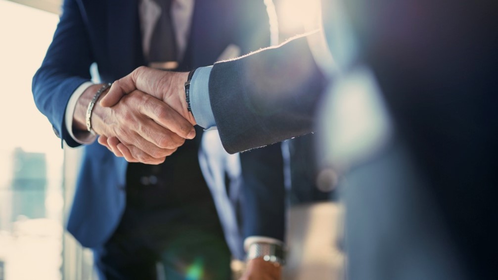 Two People Shaking Hands