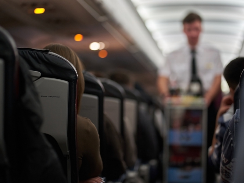 Photo of passengers on a plane