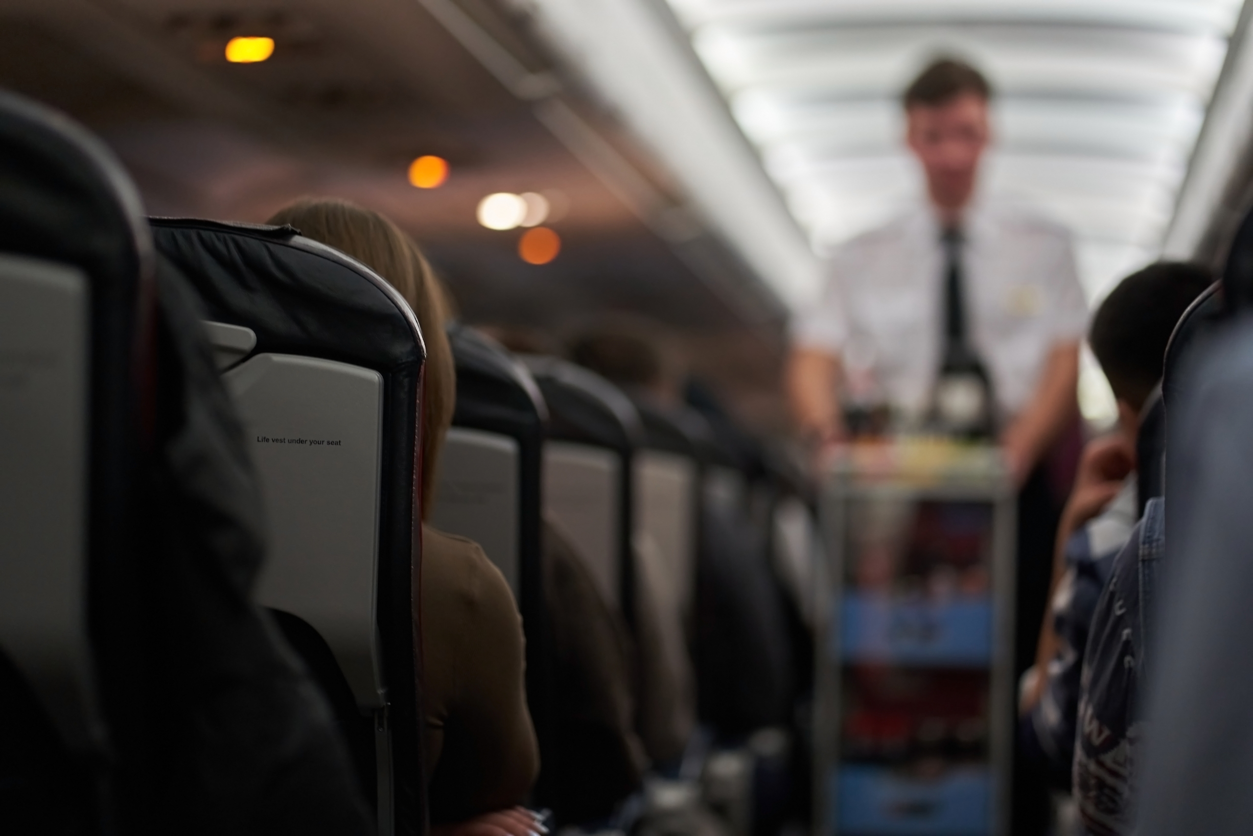 Photo of passengers on a plane