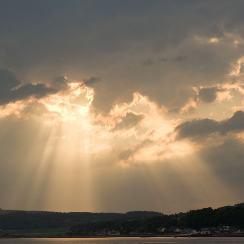 The Sun shining through clouds